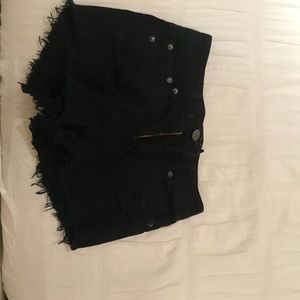 Black distressed shorts from American Eagle.